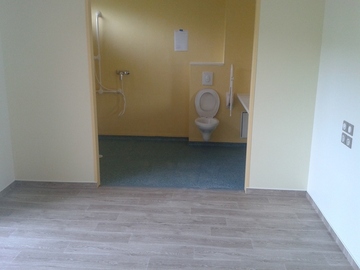 Pose d'une salle de bain en PMR
